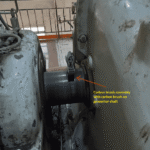 carbon-brush-on-generator-shaft.png